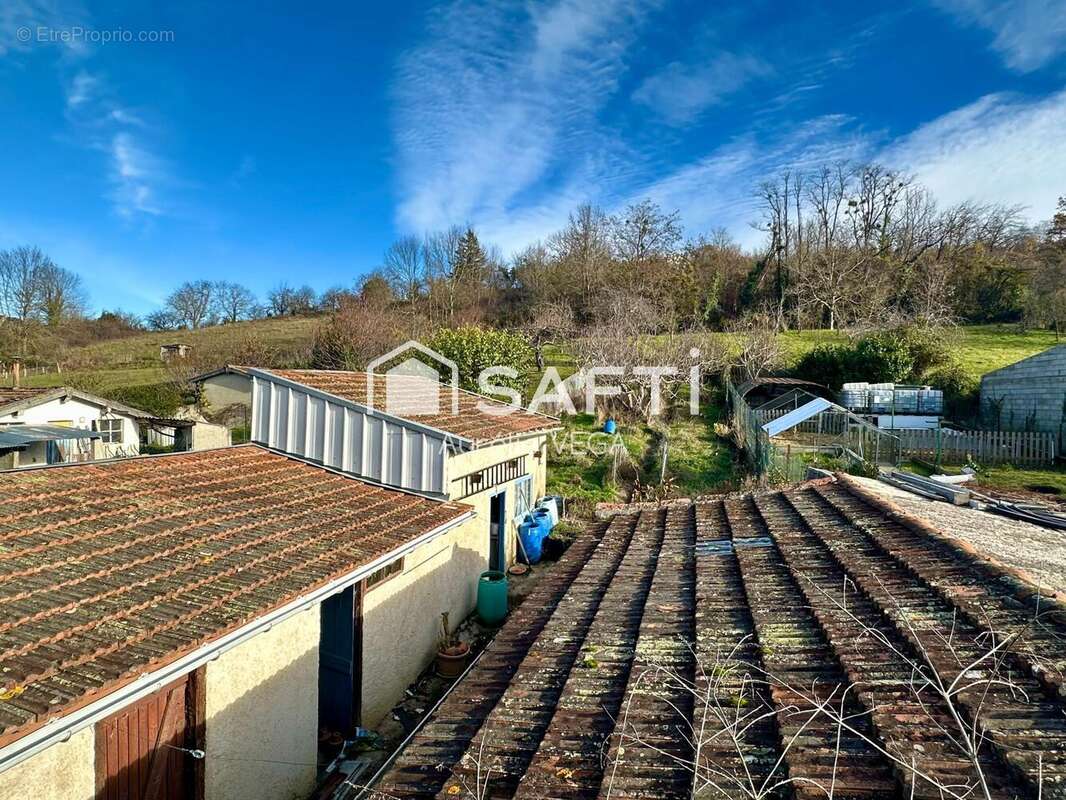 Photo 2 - Maison à LAROQUE-D'OLMES