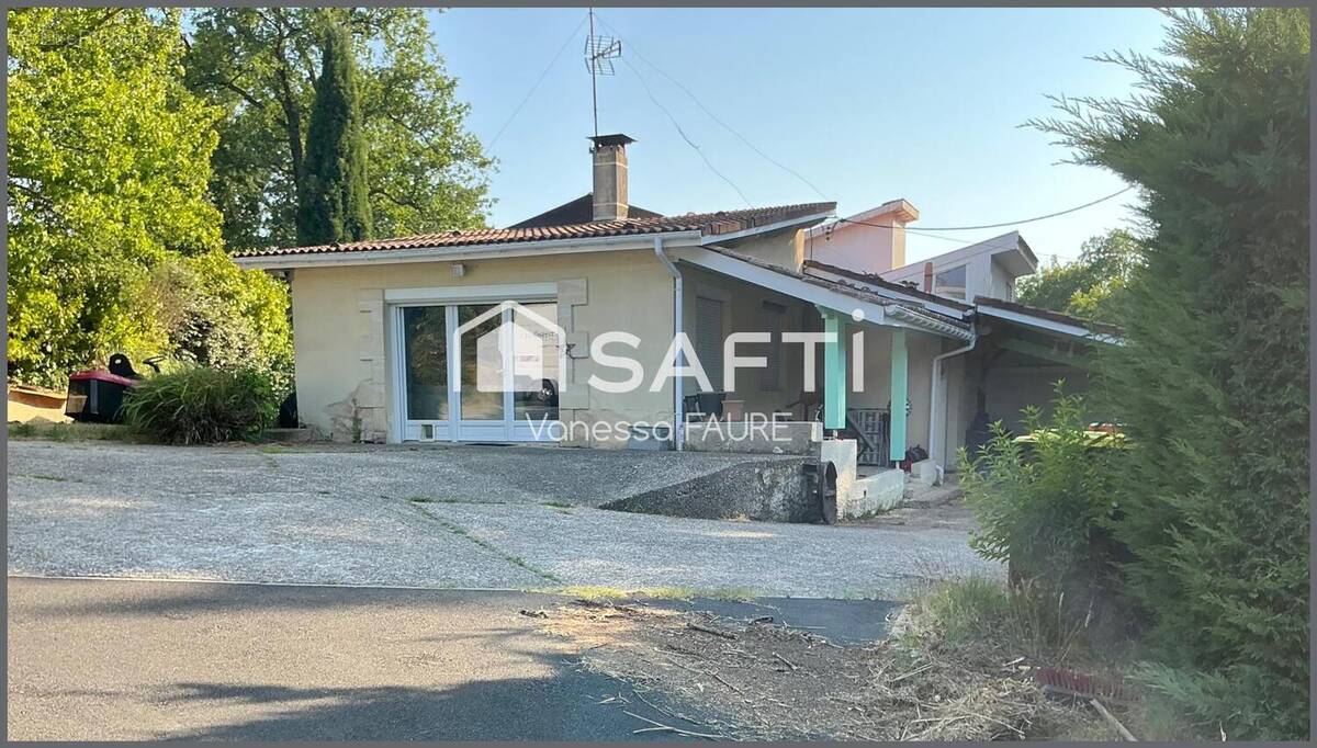 Photo 1 - Maison à SAINT-GENES-DE-LOMBAUD