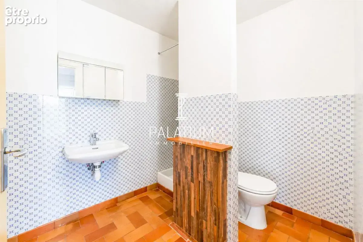 Maison de plain-pied avec jardin arboré et 3 appartements - photo 26