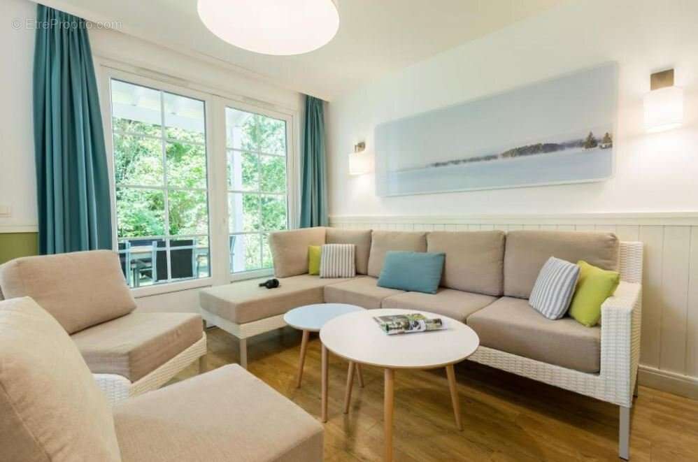 INVESTISSEMENT LOCATIF  CHAMOUILLE  Résidence tourisme Center Parcs Le Lac d'Ailette  6,32 % de rentabilité - photo 2