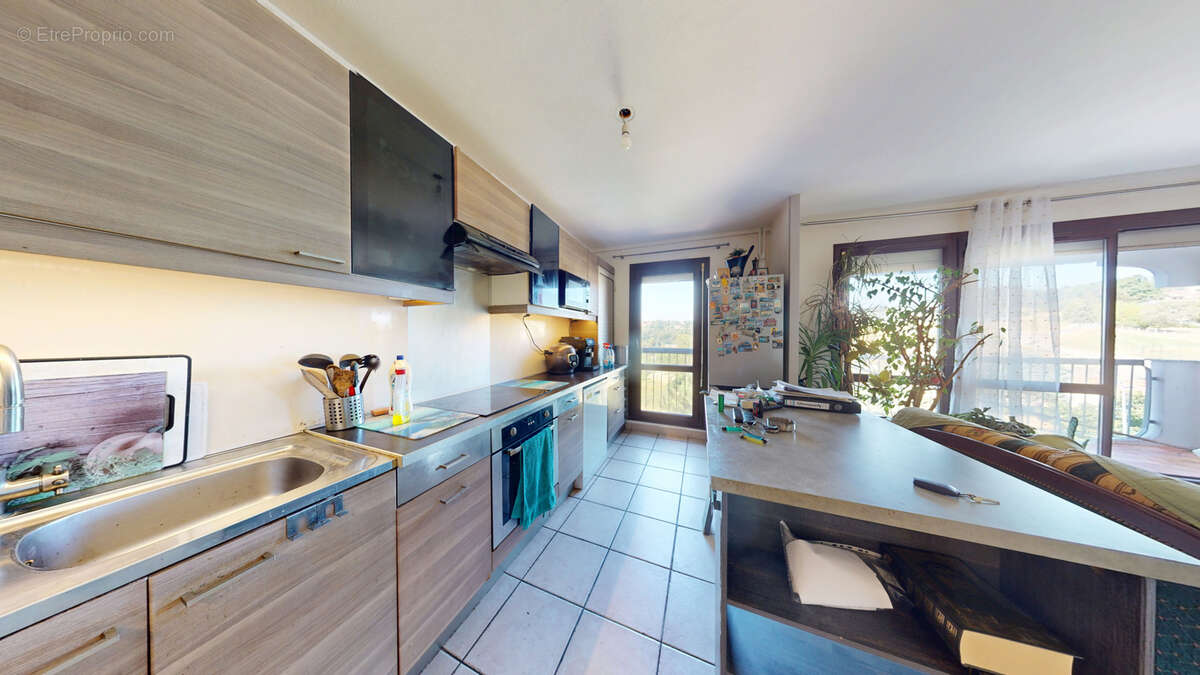 T3 avec balcon et garage - photo 2