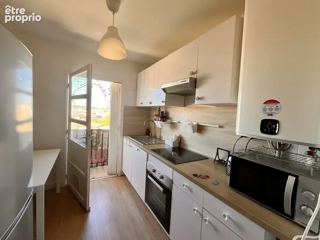 Appartement 4 pièces 64 m² à vendre à Nimes (30000) - photo 3