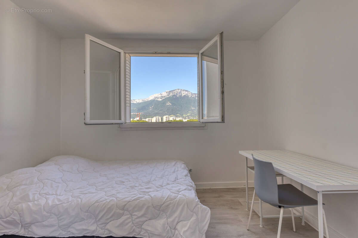 GRENOBLE MALHERBE : T3 55m2 vue massifs et cave en annexe - photo 7