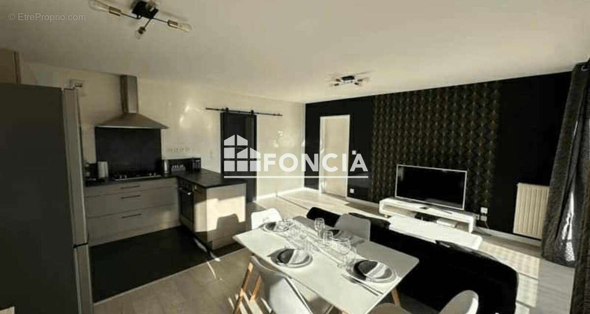 Type 4 avec balcon -  residence récente avec stationnement - photo 3