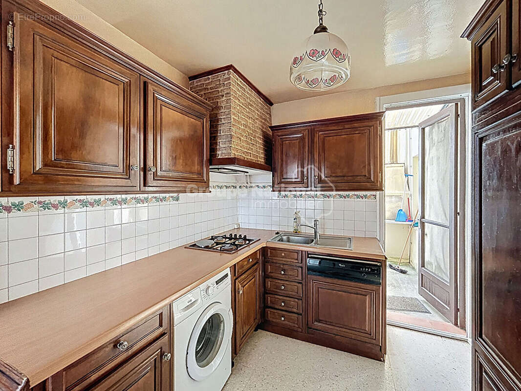 À vendre : maison mitoyenne familiale dans un quartier calme. - photo 4