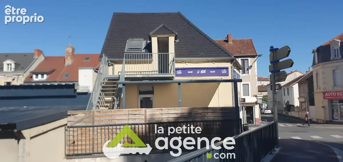 Immeuble de rapport avec local commercial bien situé - photo 2