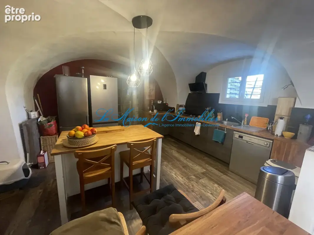 ST CHRISTOL LES ALES, maison en pierres F5 avec dépendances, chalet, piscine sur 2482 m2 de terrain avec puit - photo 6
