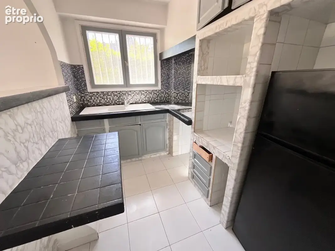 2 Pièces 42,5m2 avec sous sol aménagé 48m2 en Rez de Jardin 170m2 Garage en sous sol - photo 8