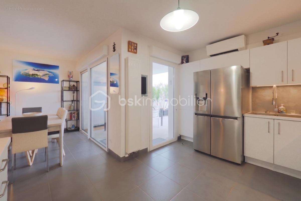 NÎMES CAPOUCHINÉ – Superbe T4 de 96 m² avec Terrasse d'Exception de 57 m² ! - photo 7