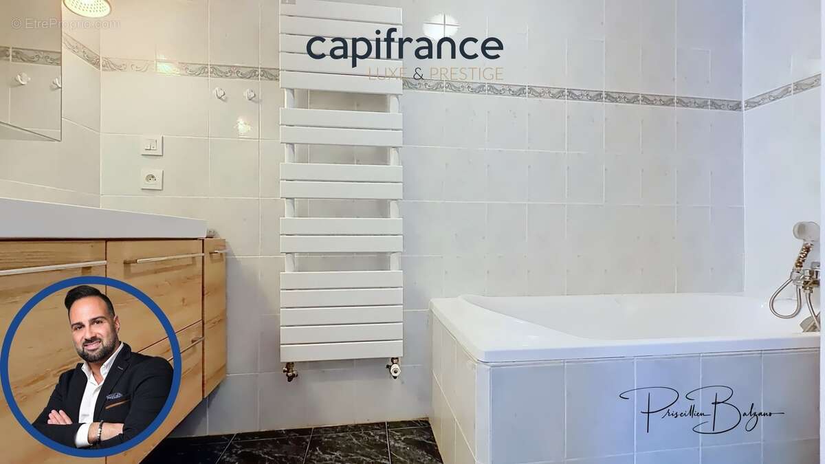 Maison à vendre 4 pièces SAINT GENIS LES OLLIERES (69) – Le charme d'une maison de village avec cour intimiste, garage et vie à  - photo 15