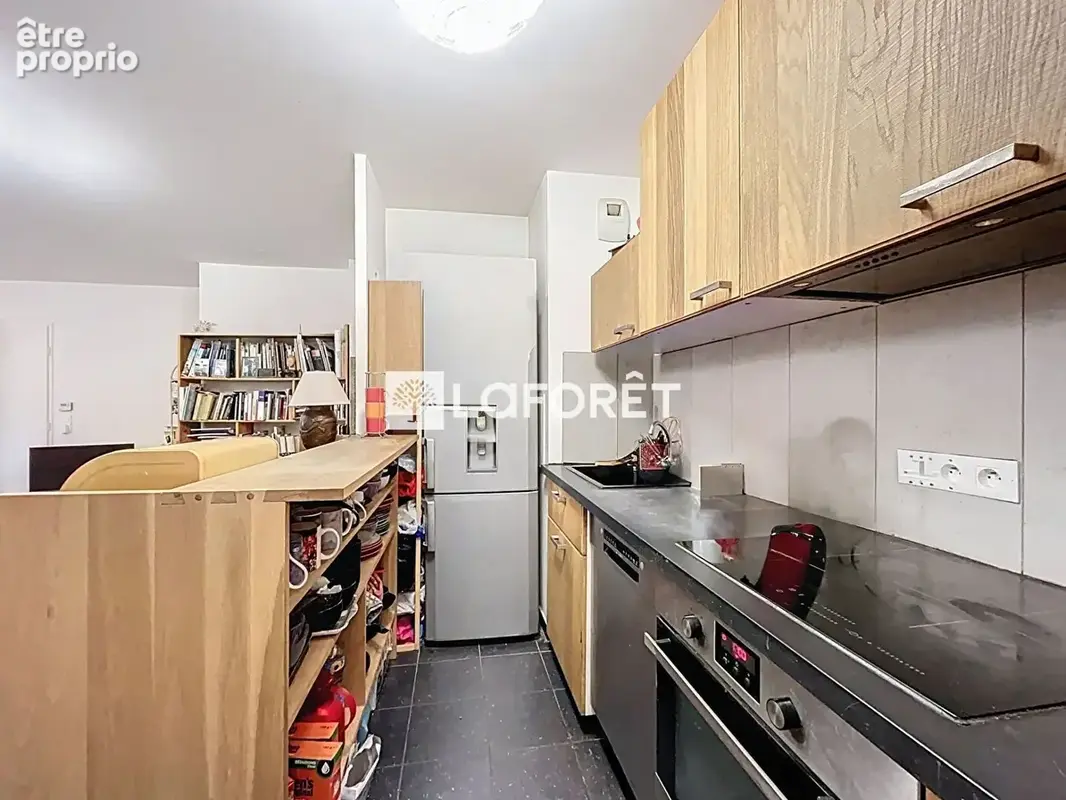 Rez-de-jardin lumineux avec grand extérieur de 86 m² - Un air de maison à Achères - photo 6