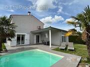 Maison à LA TALAUDIERE