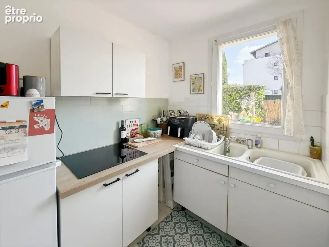 Appartement à vendre T2 situé en rez-de-jardin de 50 m² avec Jardin Privatif & Garage + climatisation - photo 10