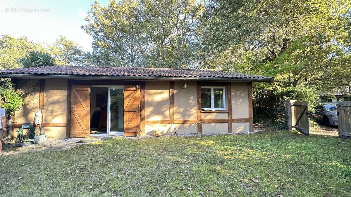 Entre Forêt Landaise et Art de Vivre  Ensemble de deux maisons sur 1638 m² de terrain boisé. - photo 25