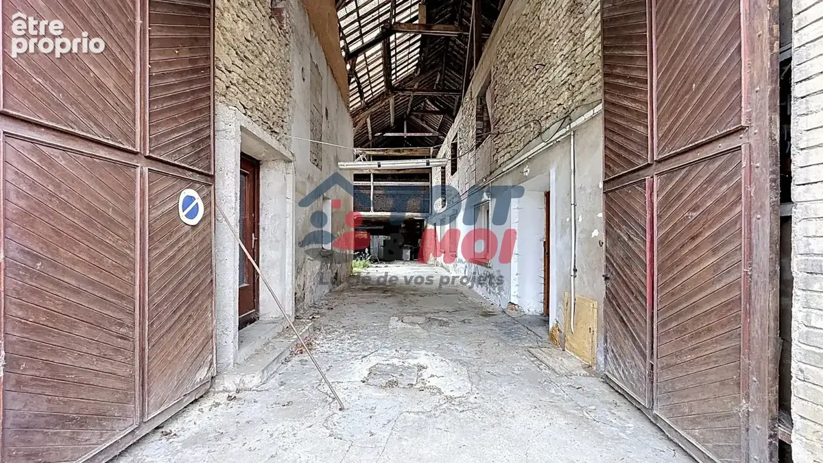 Immeuble avec appartement habitable et fort potentiel locatif - photo 4