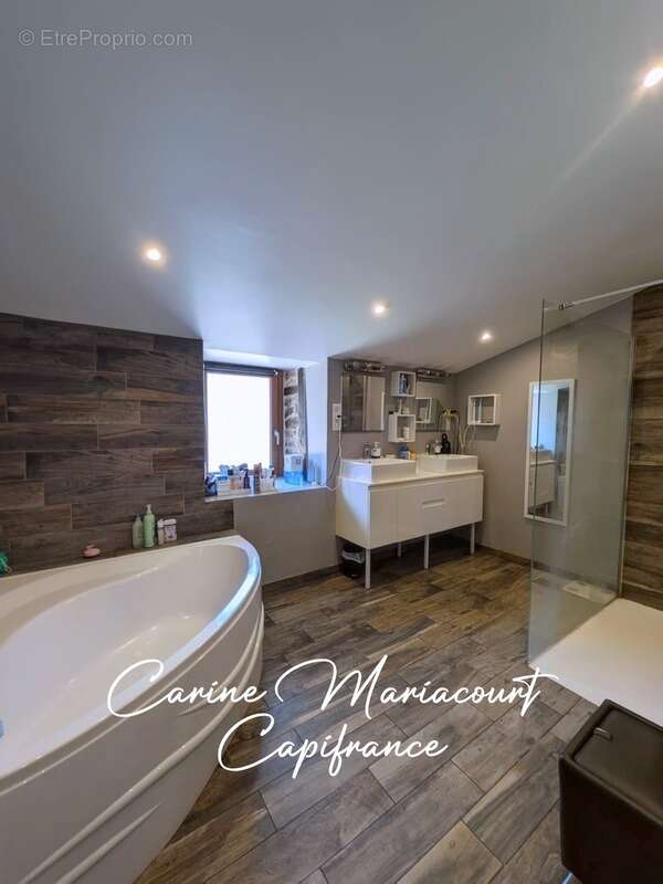 Maison en pierre rénovée de 173 m² – Terrain clos de plus de 4 500 m² – Dépendance de 155 m² – DPE C - photo 7