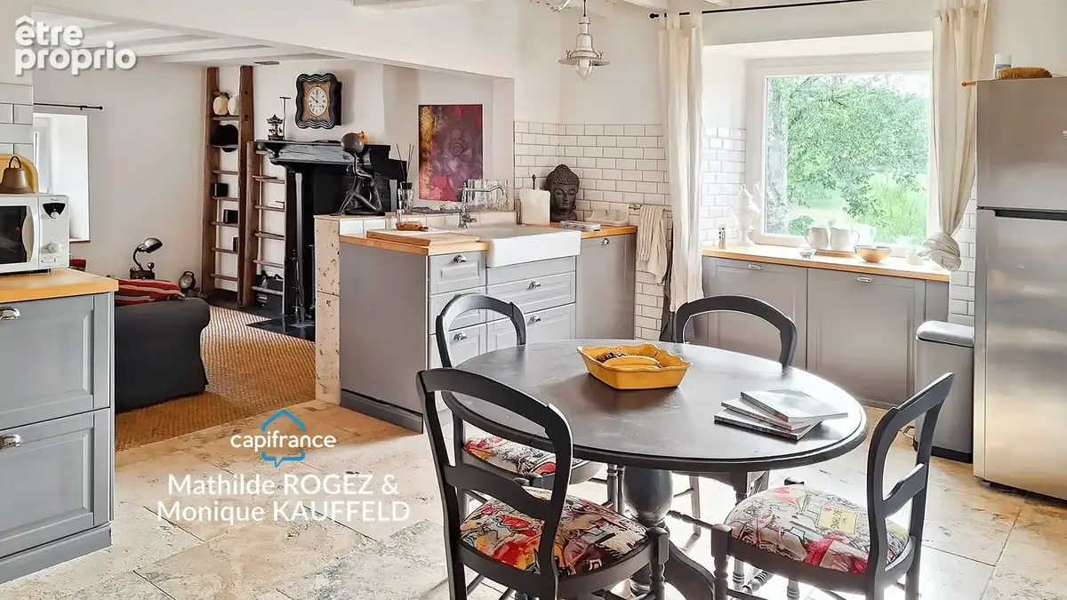 Cunlhat – belle maison en pierres rénovée – jardin 500 m² – grange - photo 3