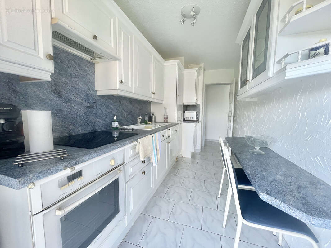 2P, 57m2+grand balcon, au calme, vue dégagée et verdoyante, proche commerces - photo 4