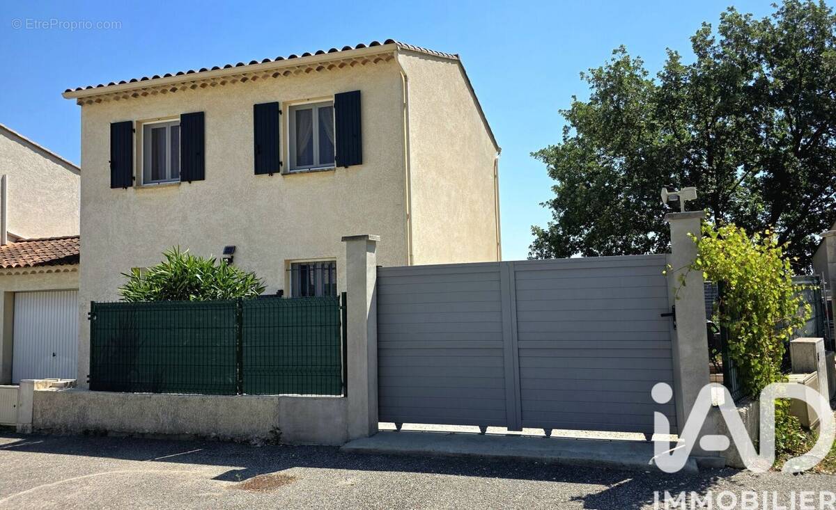 Photo 1 - Maison à SAINT-JULIEN-DE-PEYROLAS