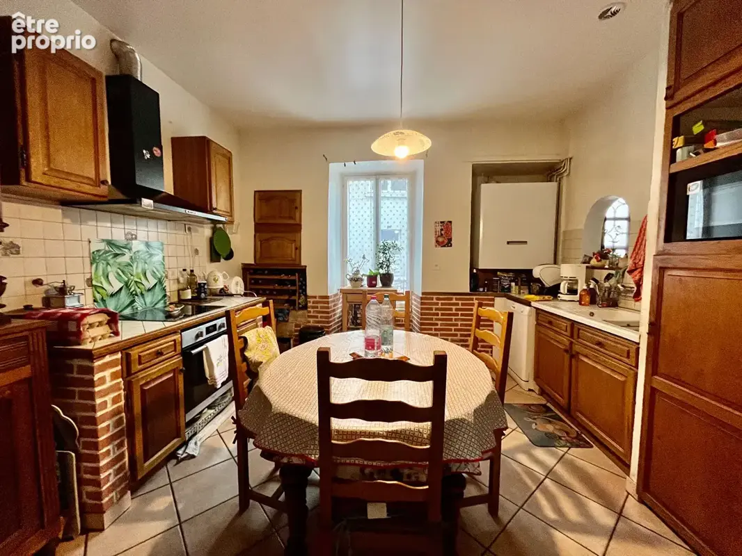 Secteur Villeneuve-sur-Lot, jolie maison de ville mitoyenne de 107 m² avec jardin et dépendances. Vous découvrirez au rez-de-cha - photo 5