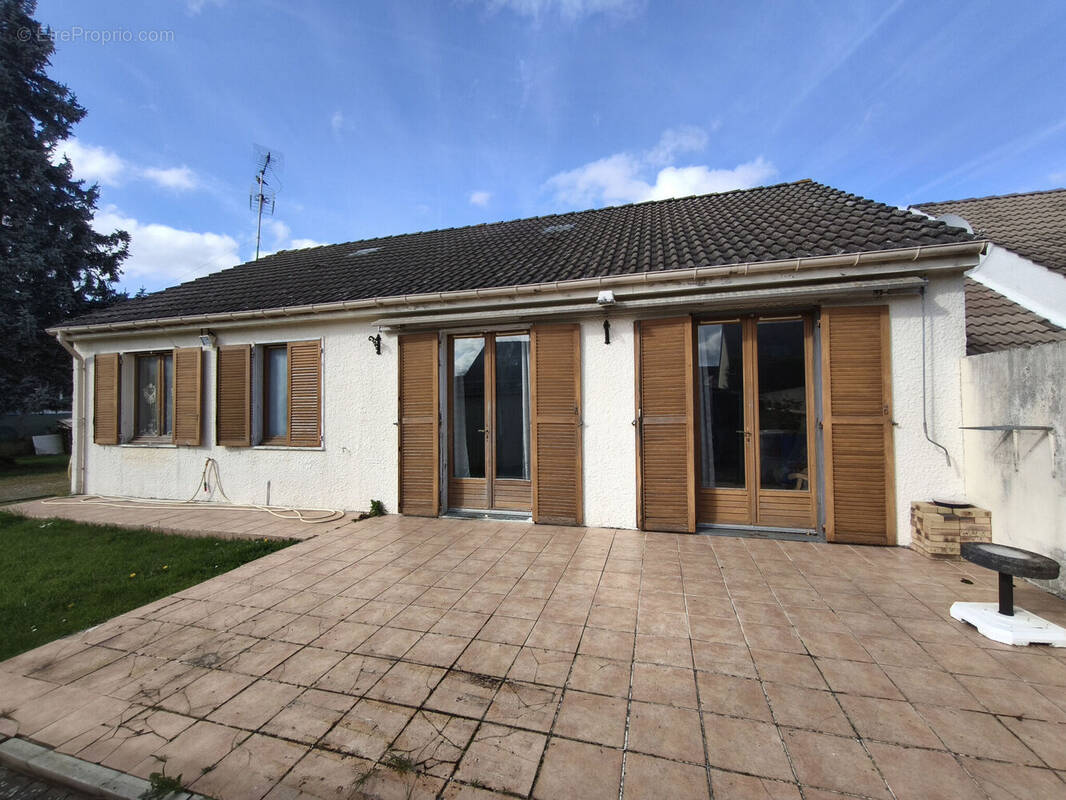 Photo 1 - Maison à TOUQUIN