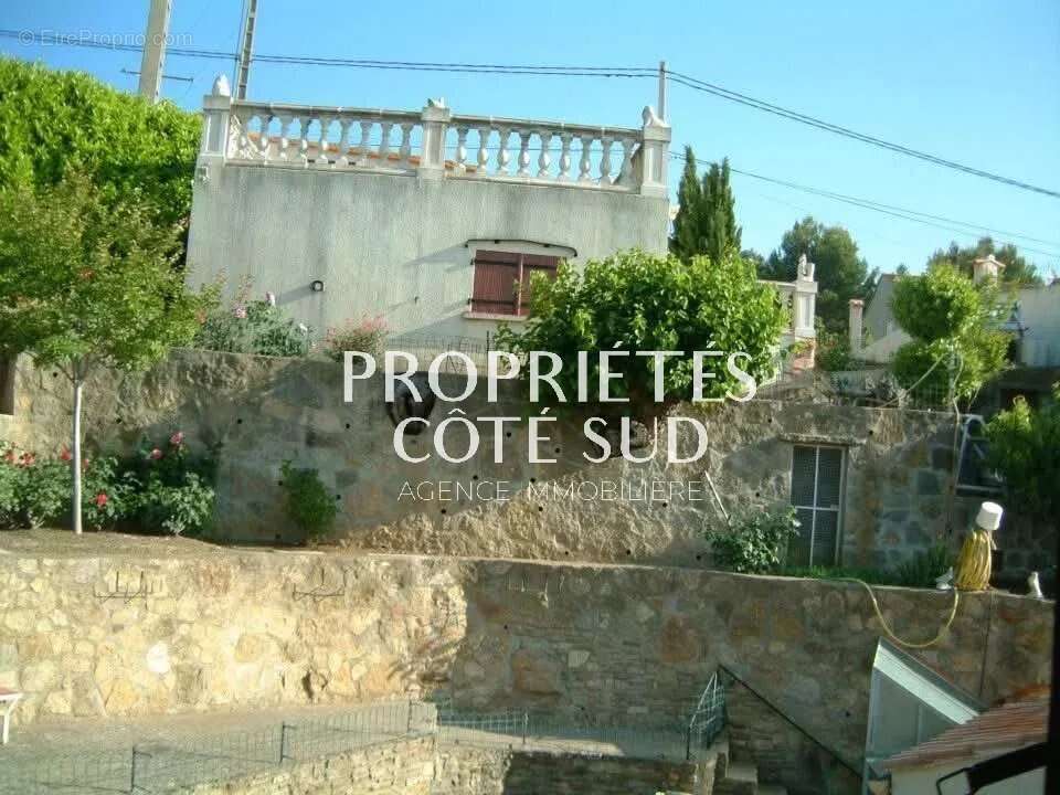 Maison à LAUDUN-L'ARDOISE
