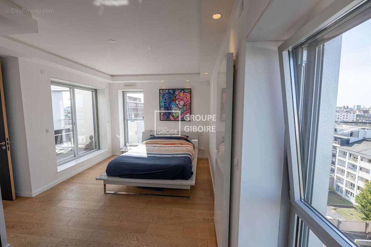 À vendre -  GROUPE GIBOIRE - Appartement 4 pièces avec garage à Rennes Gare - photo 5