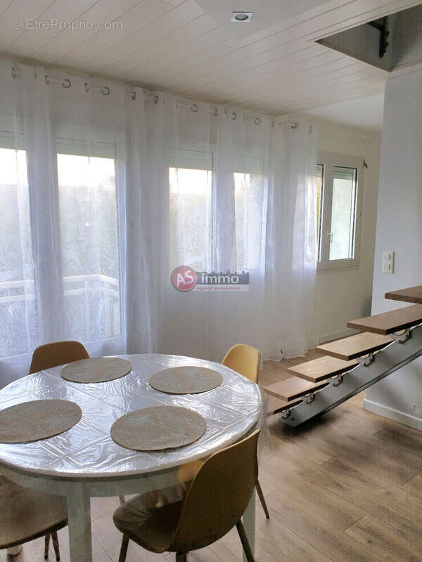 Appartement en duplex vendu meublé - 55.10 m2 hab. - photo 2