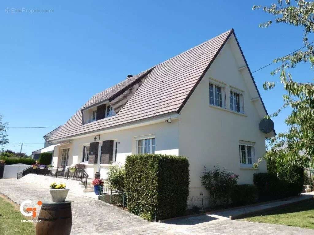 Maison à SAINT-OUEN-DE-THOUBERVILLE