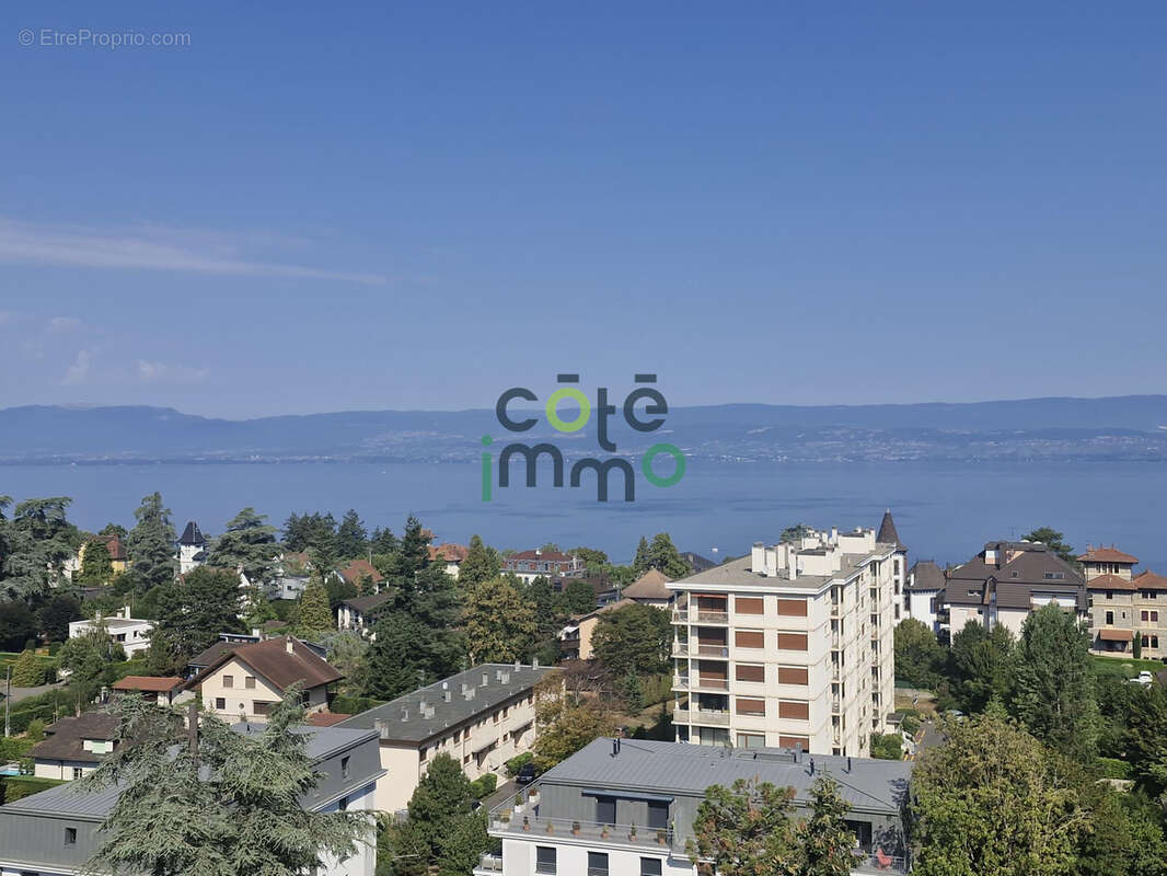Exclusivite thonon t4 avec terrasse, vue lac et 2 garages - photo 7