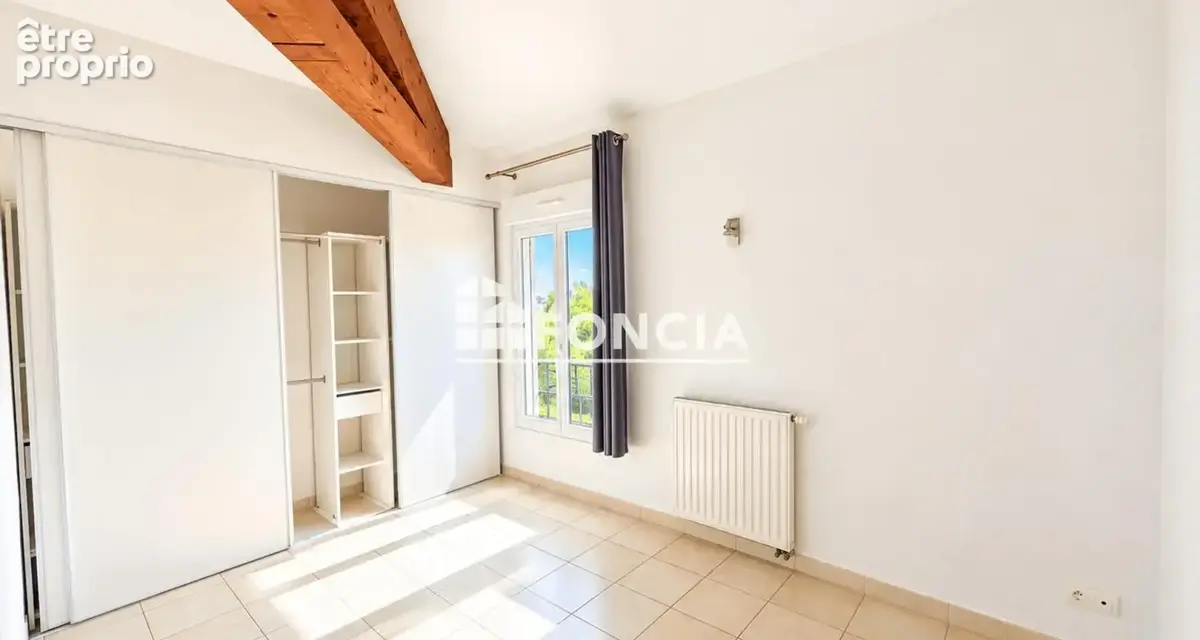 Nîmes TOUR MAGNE JARDIN DE LA FONTAINE- T3 de 82 m² avec terrasse de 15 m², climatisé, au dernier étage- Garage - photo 5