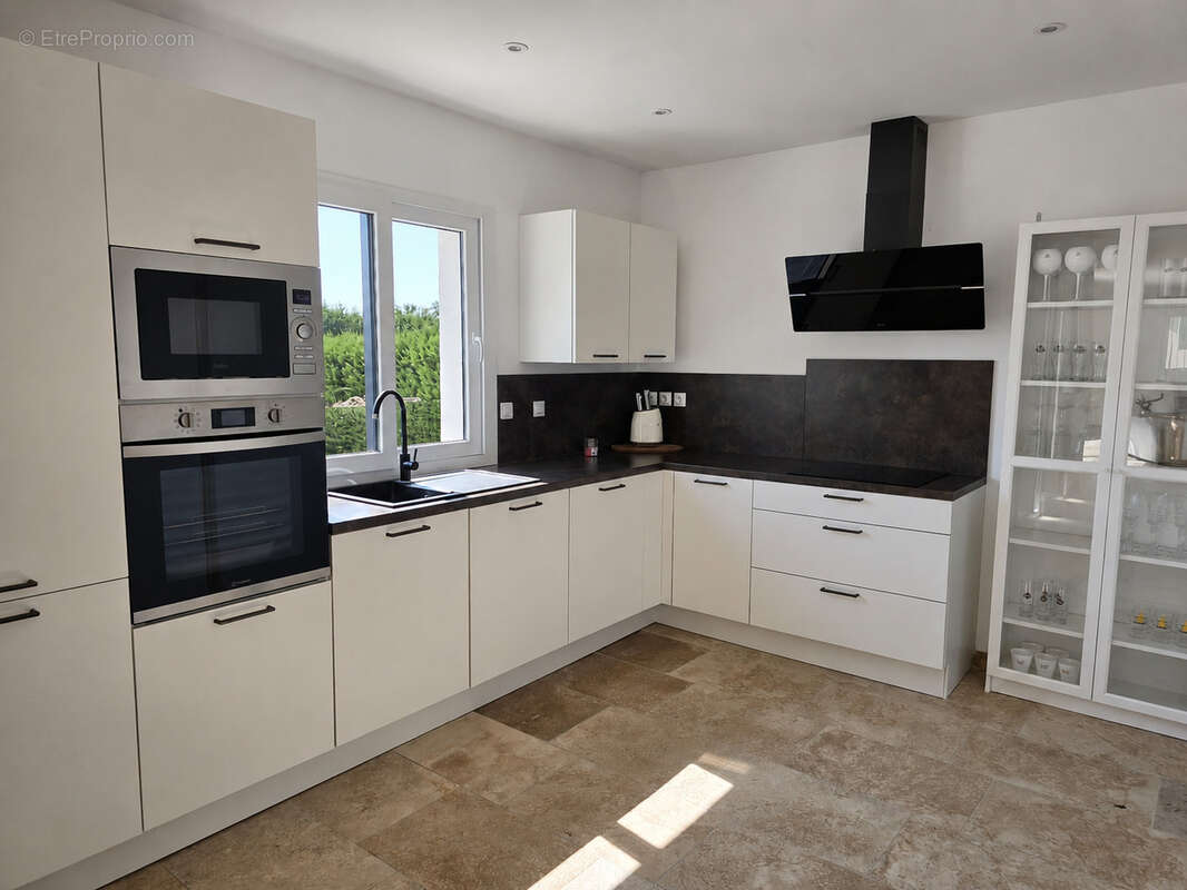 Maison 126 m² à Saint-Remy-En-Rollat  - photo 3