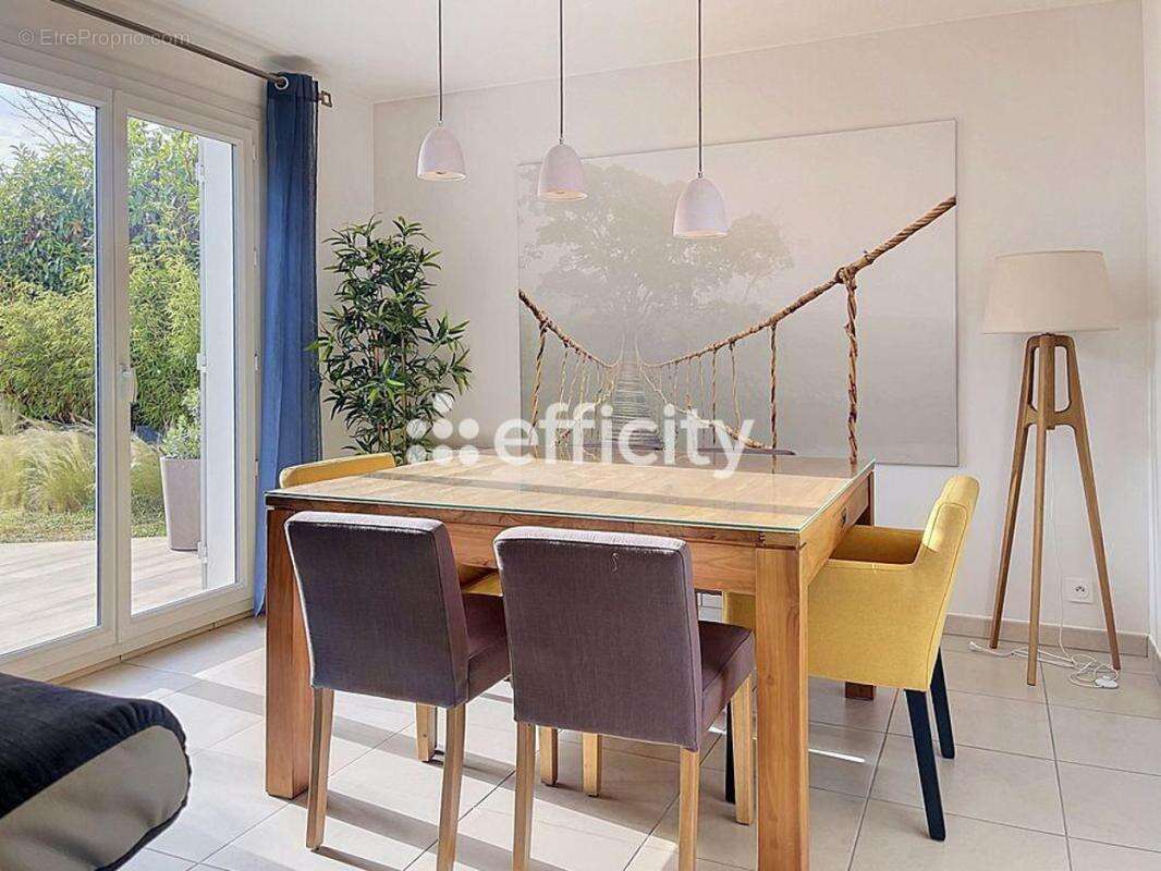 Maison 86 m² à Vaulx-Milieu  - photo 4