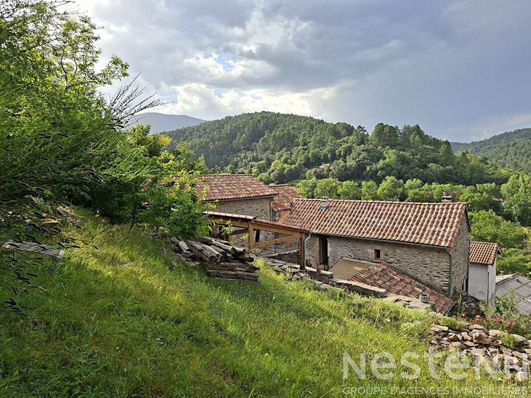 Maison en pierre rénovée de 124 m2 avec 7 678 m² de terrain - Havre de paix en Cévennes - photo 8