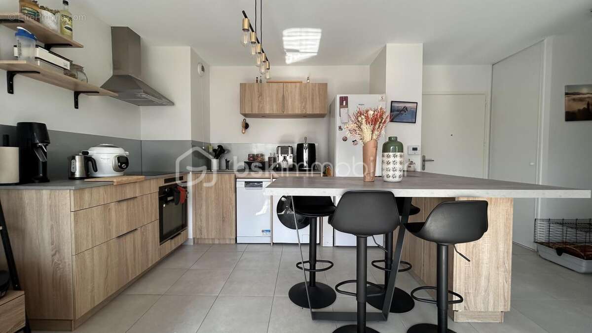 T2 récent 43 m² avec balcon 9,4 m² + parking sous-sol - photo 5