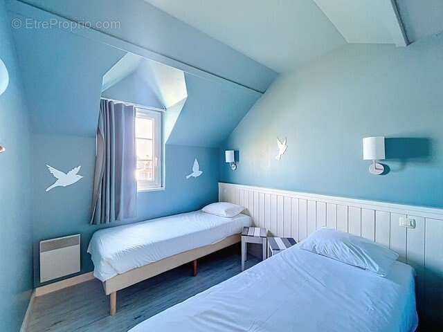 INVESTISSEMENT LOCATIF  CHAMOUILLE  Résidence de tourisme Center Parcs Le Lac d'Ailette - 7 % de rentabilité - photo 7