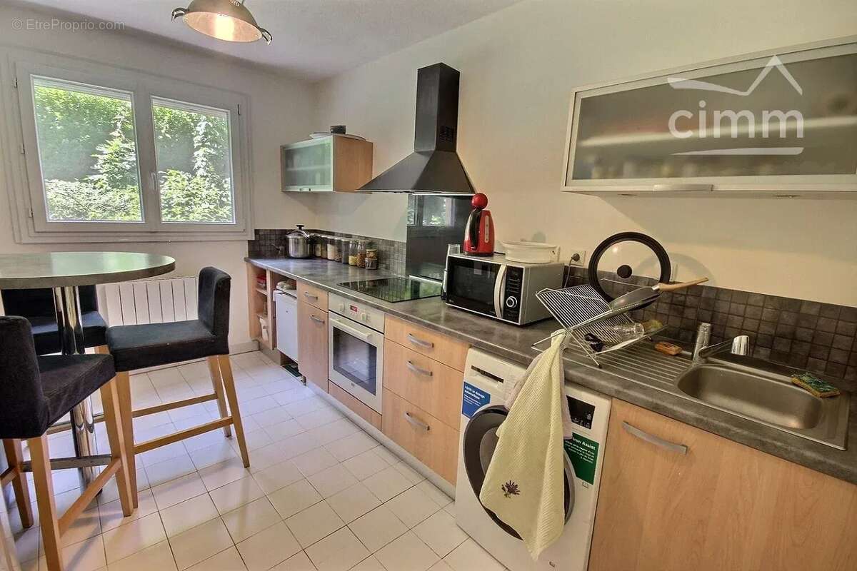 Vente t2 + garage  saint-etienne - photo 4