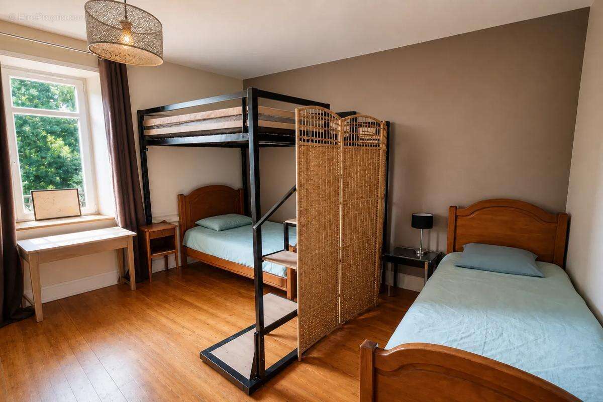 Maison de 7 pièces de 222 m² à Flavignac - photo 11