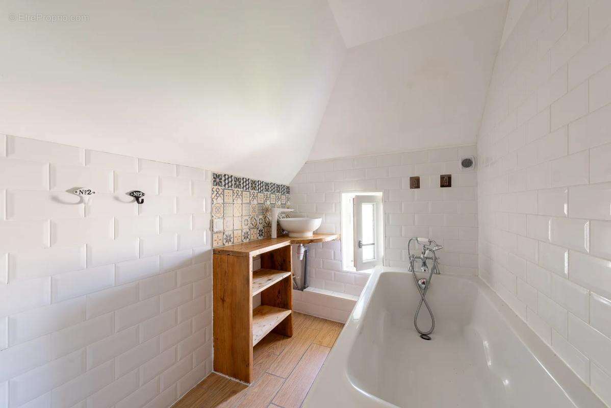Maison de 4 pièces de 90 m² à Villeneuve-sous-Dammartin - photo 15