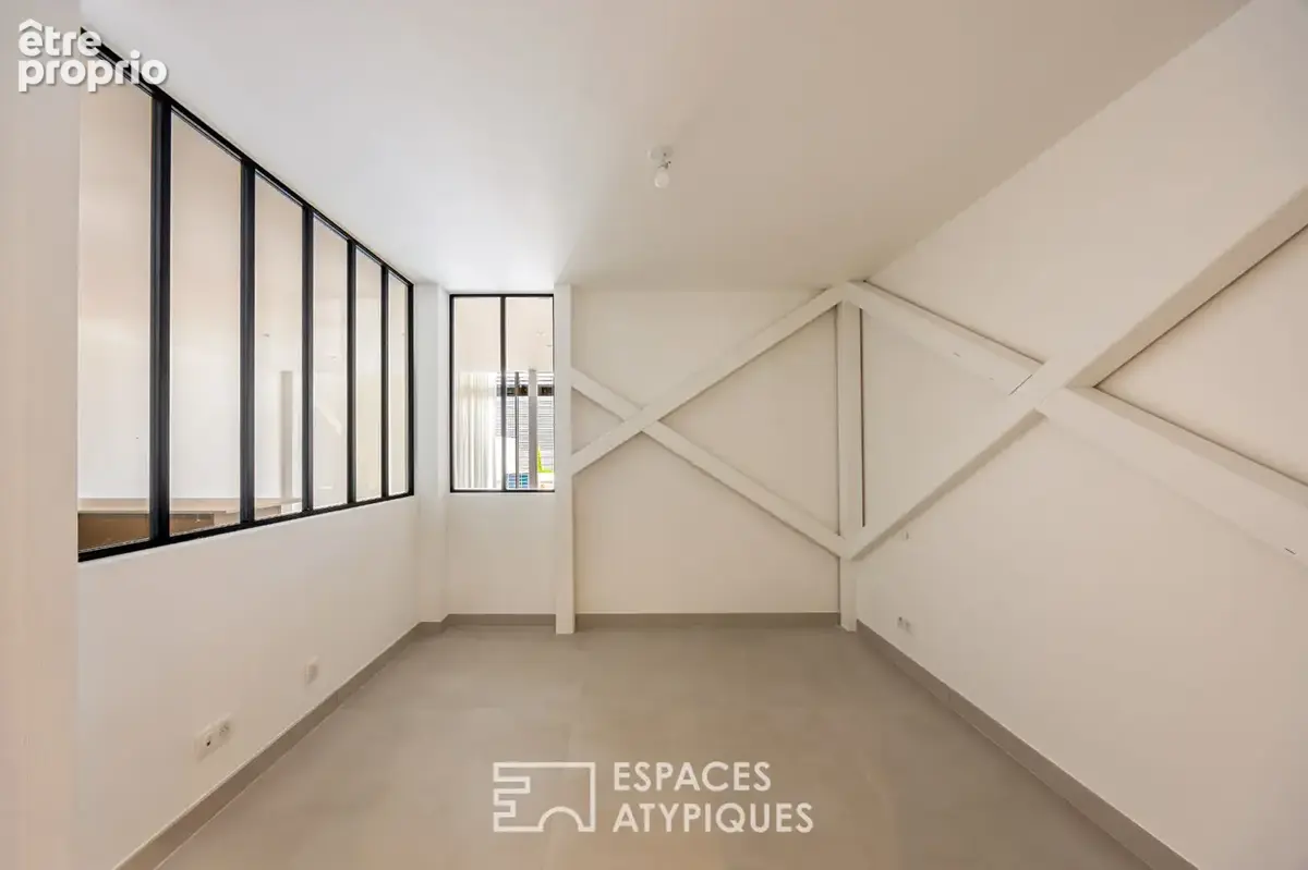 Loft contemporain en duplex et sa terrasse dans une ancienne friche industrielle - photo 4