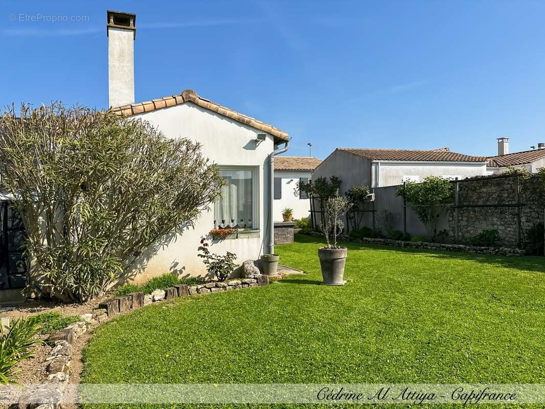 Maison à vendre à Puilboreau de plain-pied, 7 pièces, 175m², jardin et garage - photo 9