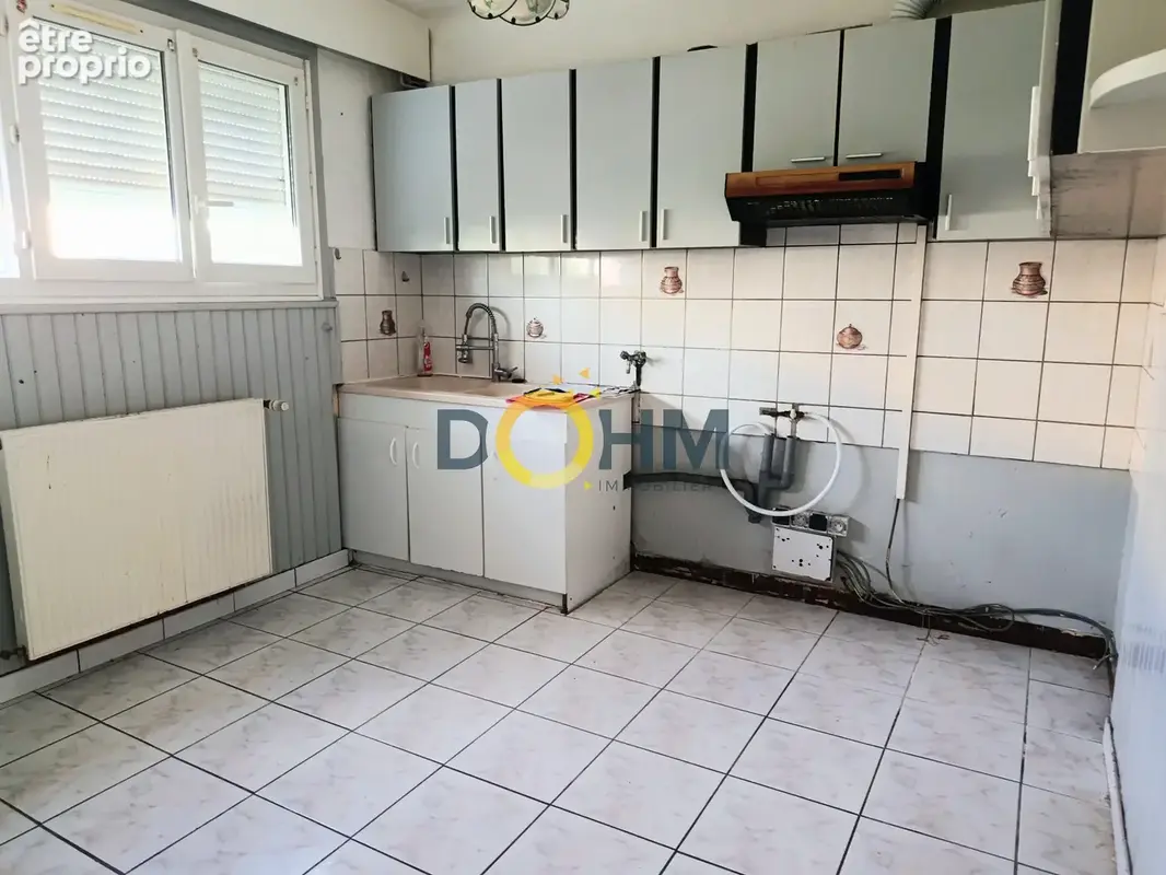 Maison de 102m2 mitoyenne d'un coté - photo 2