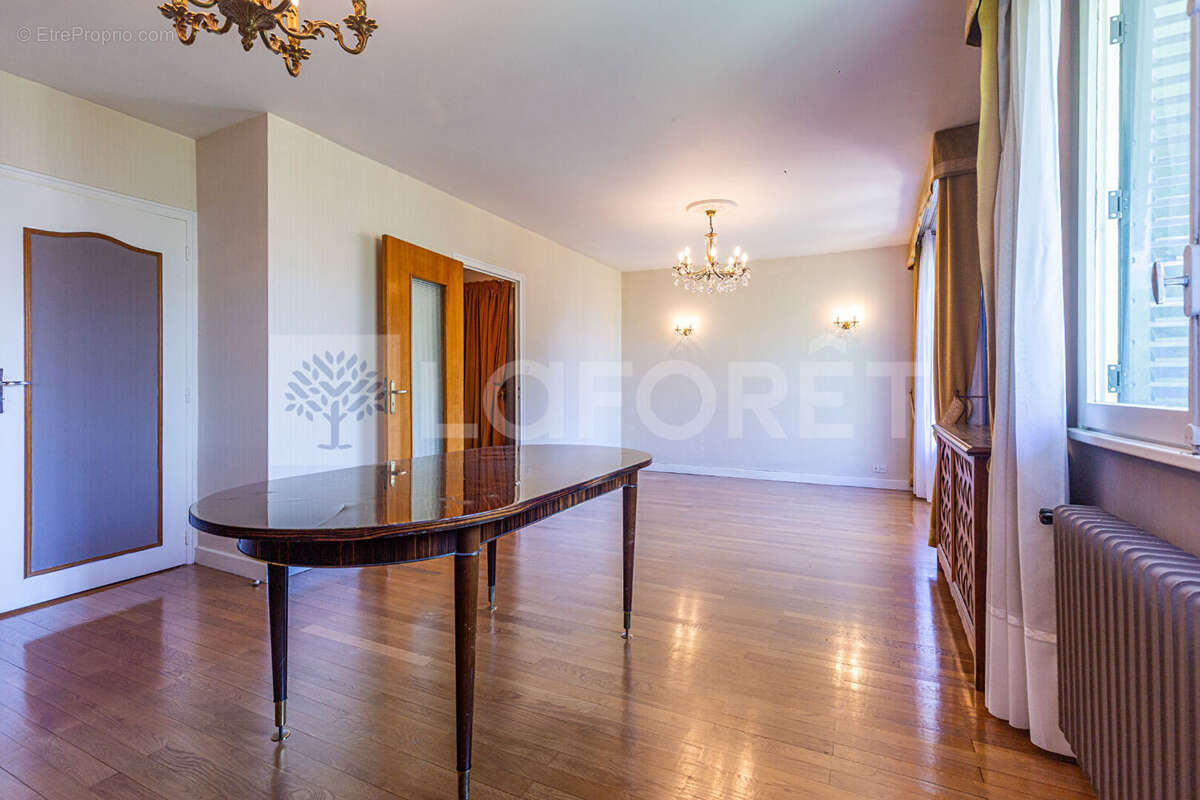 Agence immobiliere laforet - "hedera" - annecy - appartement t4 de 72.66m² - balcon - loggia - traversant - dernier etage - cave - photo 2