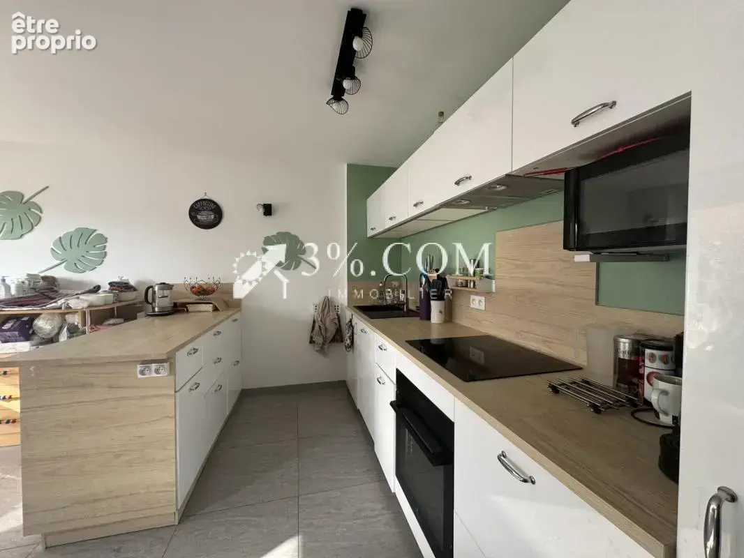 3%COM appartement F3 en rez de jardin - garage- parking - photo 5