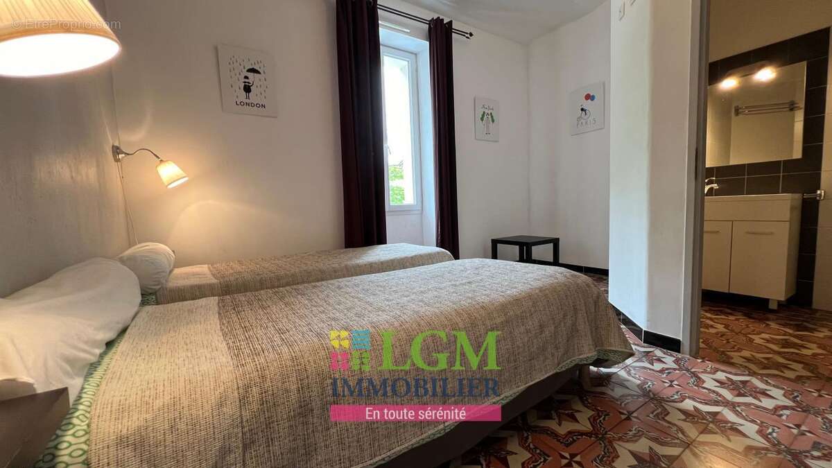 Maison à SAINT-JULIEN-LES-ROSIERS