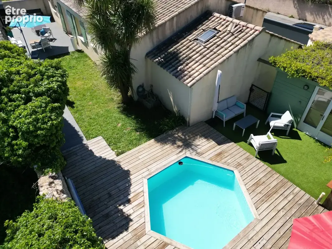 Maison de plain-pied de 122 m²  située à Poussan, sur une parcelle de 492 m². - photo 4