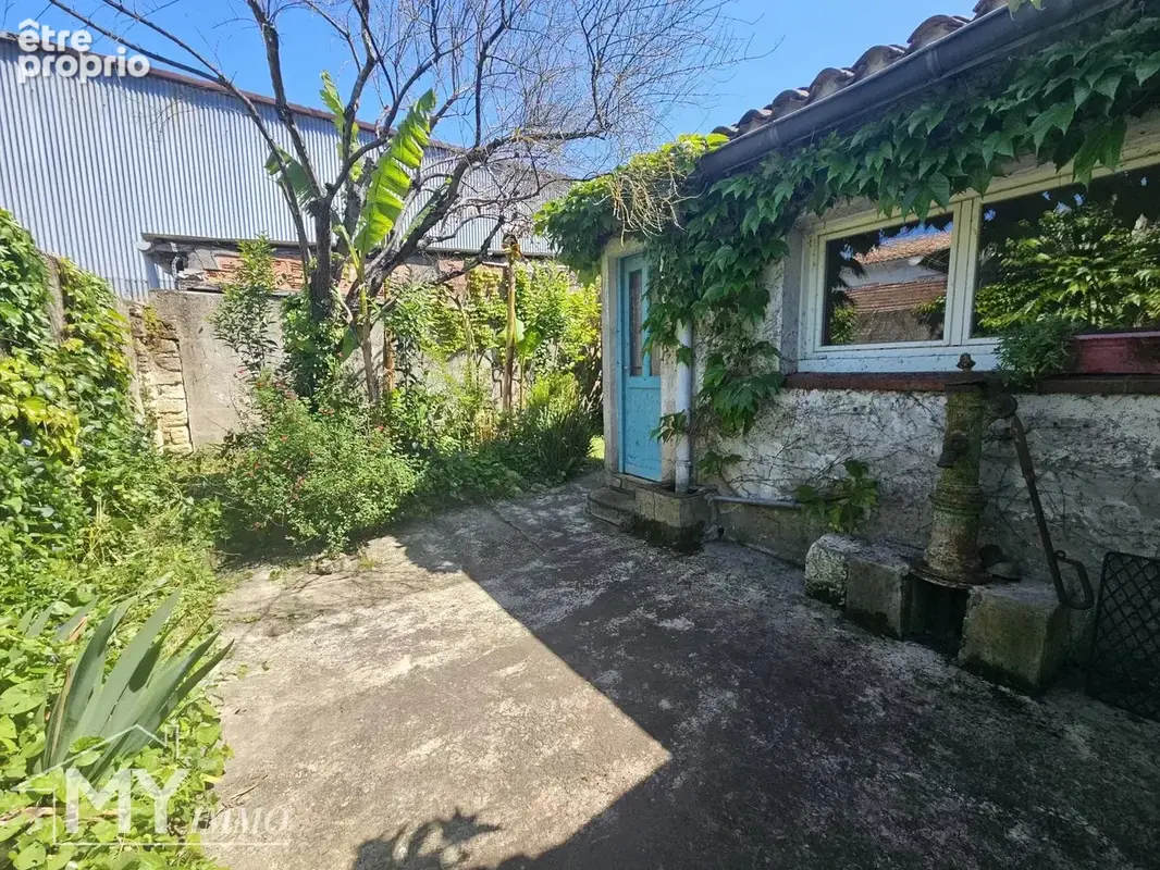 Immeuble de 164 m² habitable avec local commercial, patio et garage - photo 13