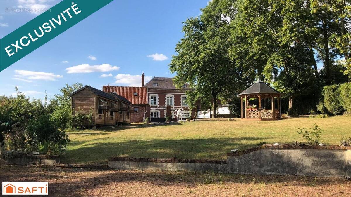 Photo 1 - Maison à BRETEUIL