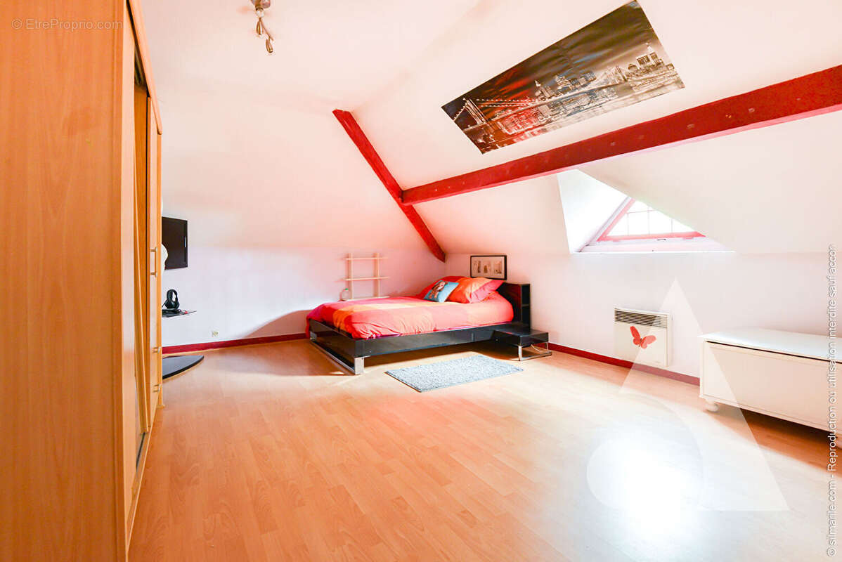 Le confort d'une grande maison à Herblay : 223 m², 6 chambres et jardin - photo 11