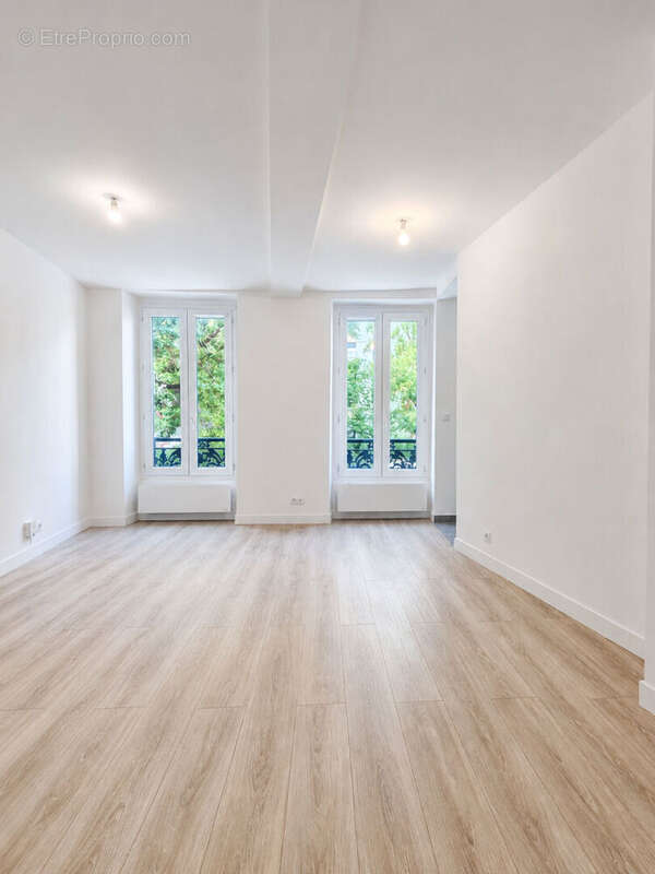 Appartement Paris 2 pièce(s) 35 m2 - photo 2